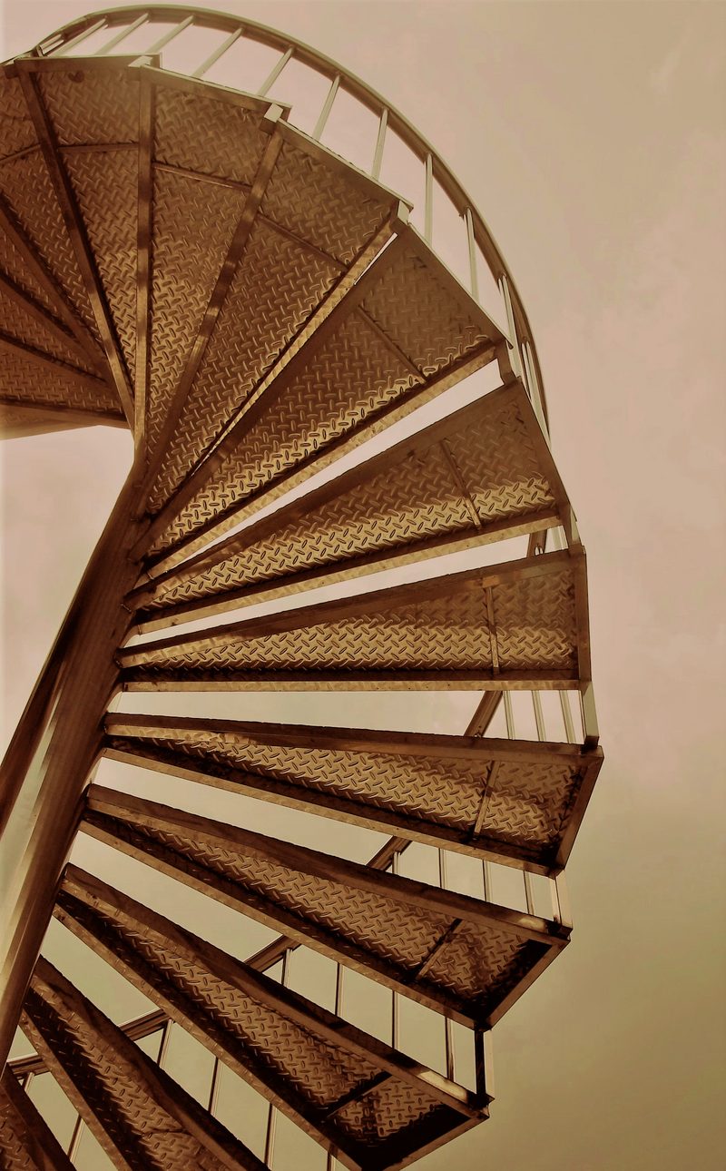 Spiral metal staircase seen from below